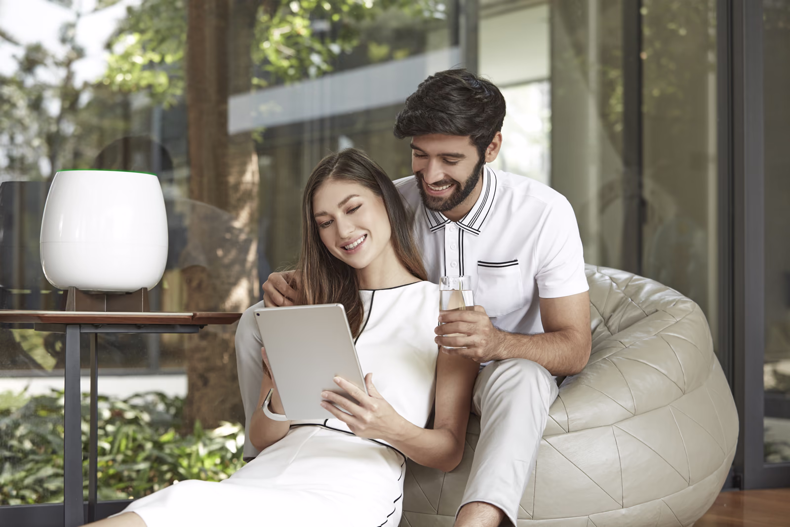 Couple relaxing at home beside HomePure Zayn White
